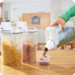 Cereal Storage Container with Measuring Cup and Handle